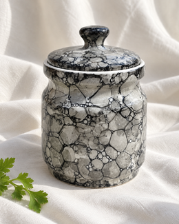 Black Marble Ceramic Pickle Jar - 1200 ml, displayed on fabric
