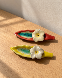 Leaf and Flower Ceramic Incense Holders - Red and Yellow, Set of 2, photographed in natural sunlight