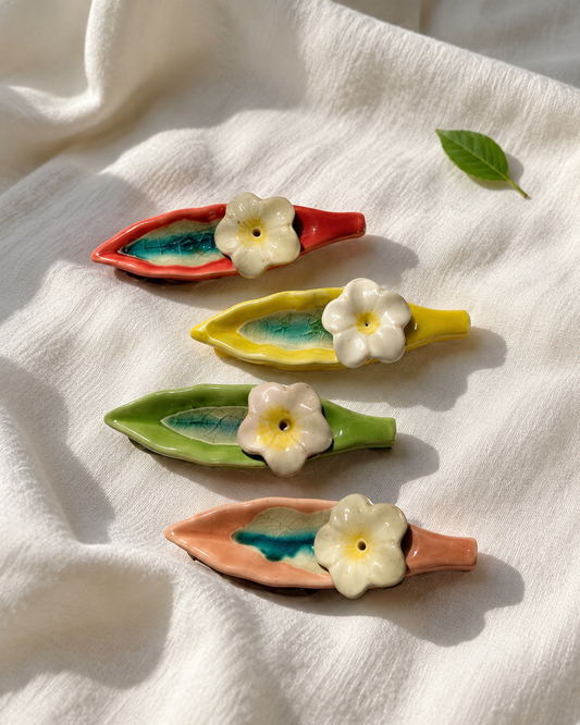 Leaf and Flower Ceramic Incense Holders - Multicolor, Set of 4, displayed on fabric