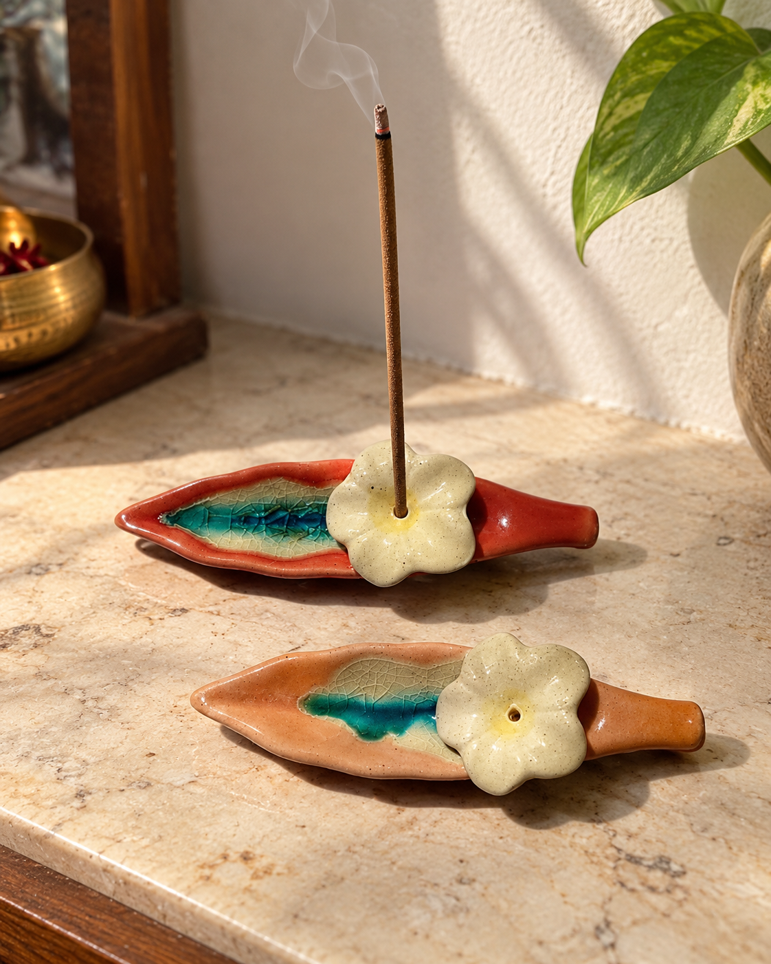 Leaf and Flower Ceramic Incense Holders - Red and Pink, Set of 2, styled in a home setting