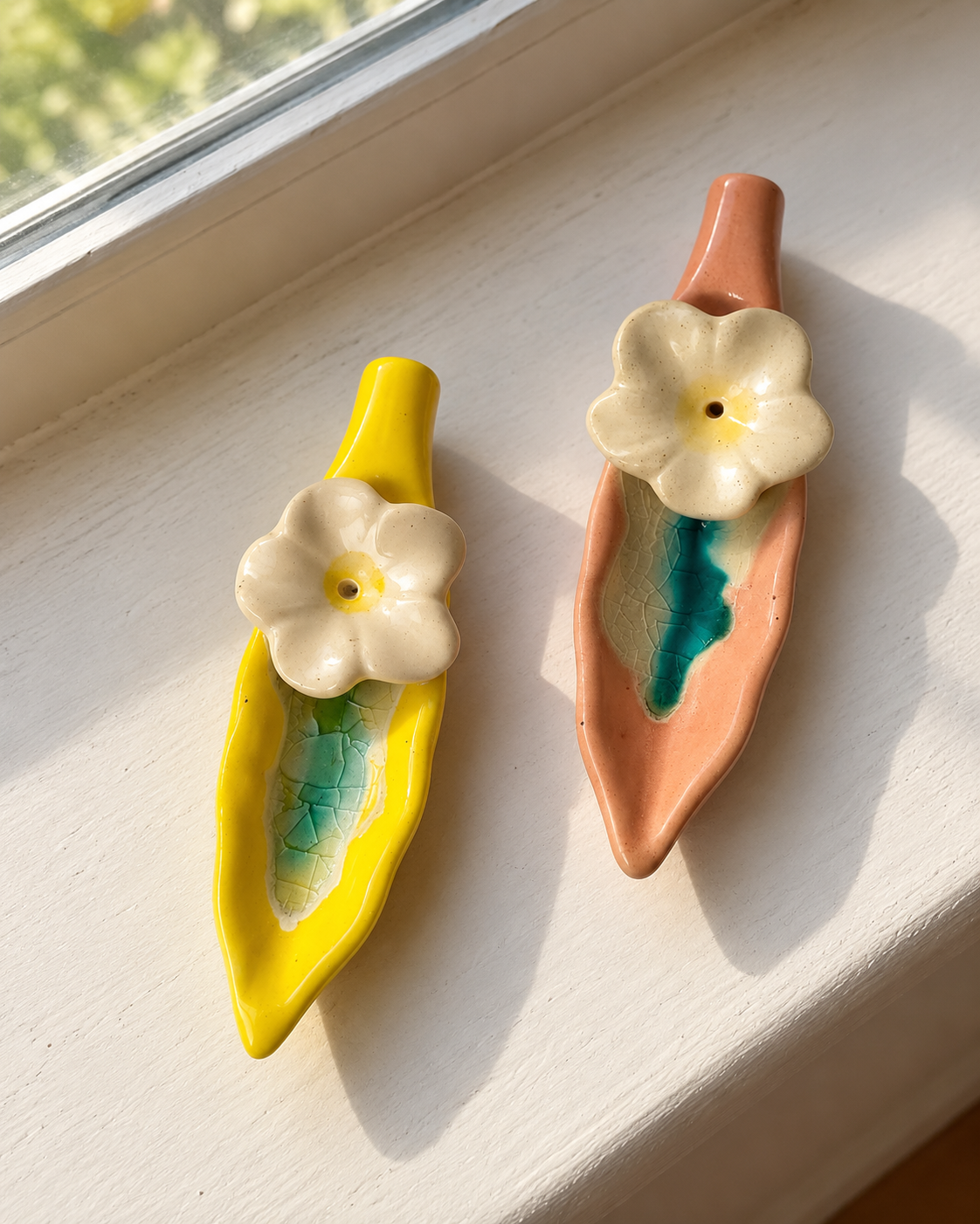 Leaf and Flower Ceramic Incense Holders - Yellow and Pink, Set of 2, photographed in natural sunlight
