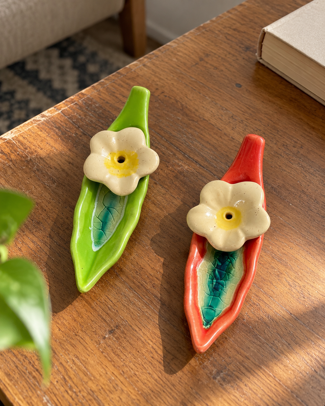 Leaf and Flower Ceramic Incense Holders - Red and Green, Set of 2, styled in a home setting