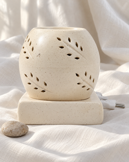 Coconut Shape Electric Ceramic Aroma Diffuser, displayed on fabric