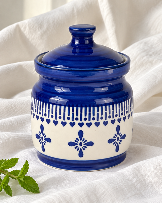 Blue Floral Border Ceramic Pickle Jar - 1000 ml, displayed on fabric