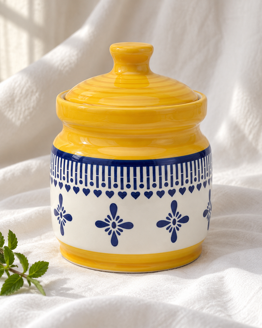 Yellow Floral Border Ceramic Pickle Jar - 1000 ml, displayed on fabric