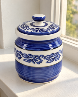 Blue Floral Ceramic Pickle Jar - 1200 ml, photographed in natural sunlight