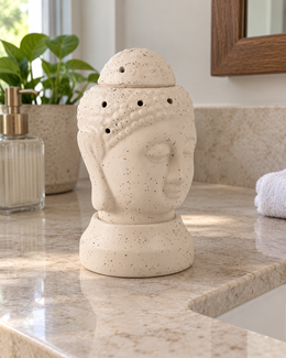 Buddha Shape Electric Ceramic Aroma Diffuser, styled in a home setting