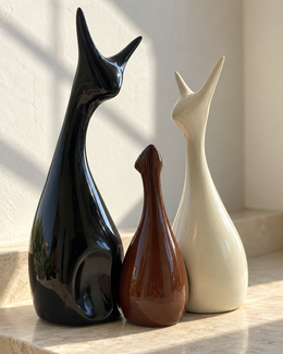 Monochrome Deer Family Ceramic Figurines - Set of 3, photographed in natural sunlight
