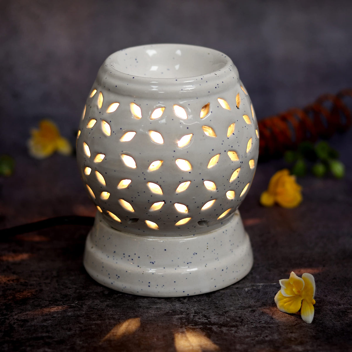 Round Cutwork Electric Ceramic Aroma Diffuser - home lifestyle view