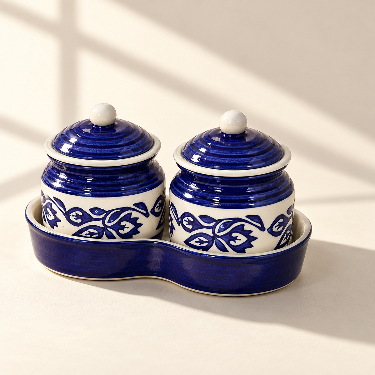 Blue Floral Ceramic Jar Set of 2 with matching lids and tray on a plain ivory backdrop