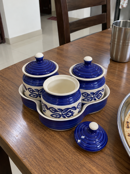 Blue Floral Ceramic Jar Set of 3 — open detail view on a dining table