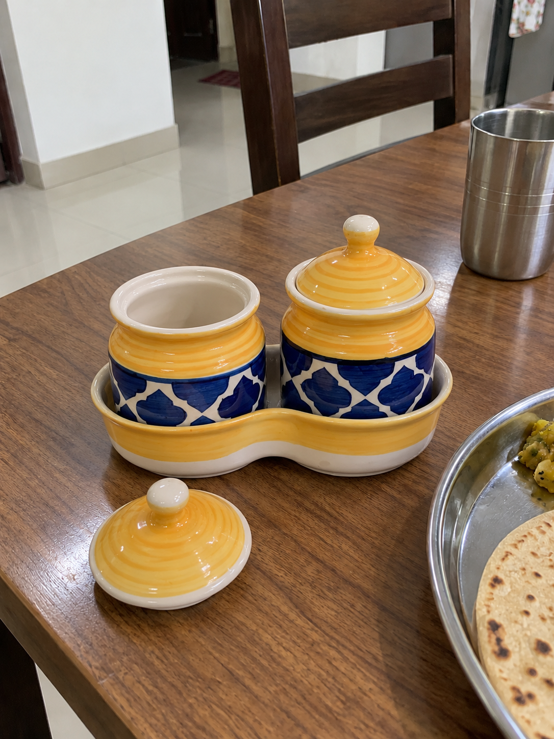 Yellow Geometric Ceramic Jar Set of 2 — open detail view on a dining table