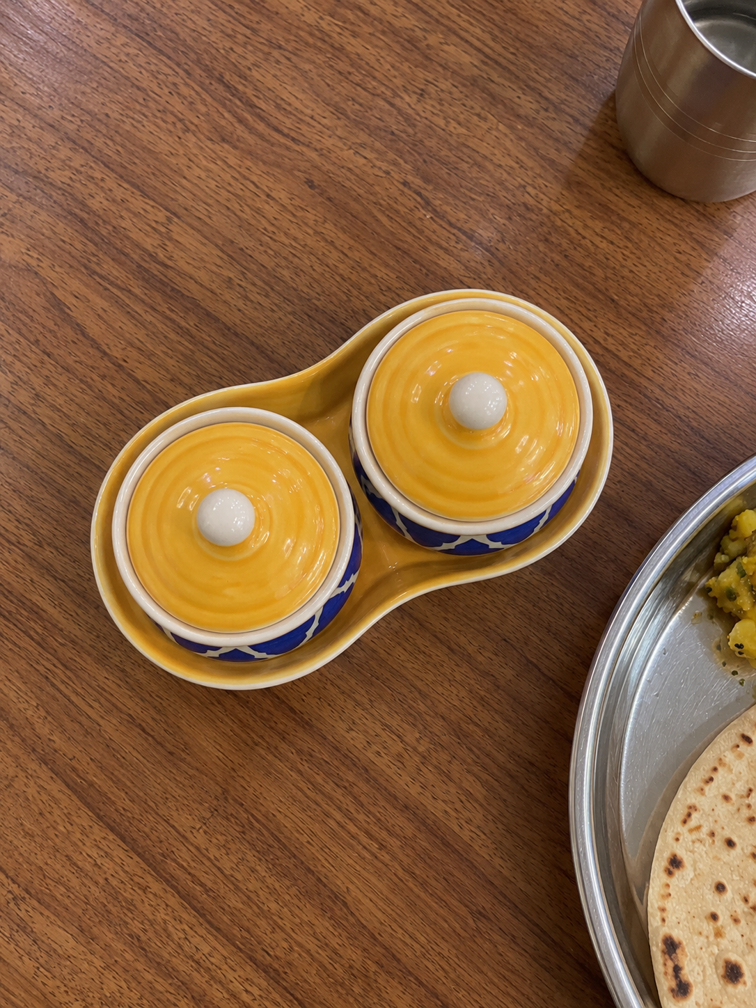 Yellow Geometric Ceramic Jar Set of 2 — overhead view on a dining table