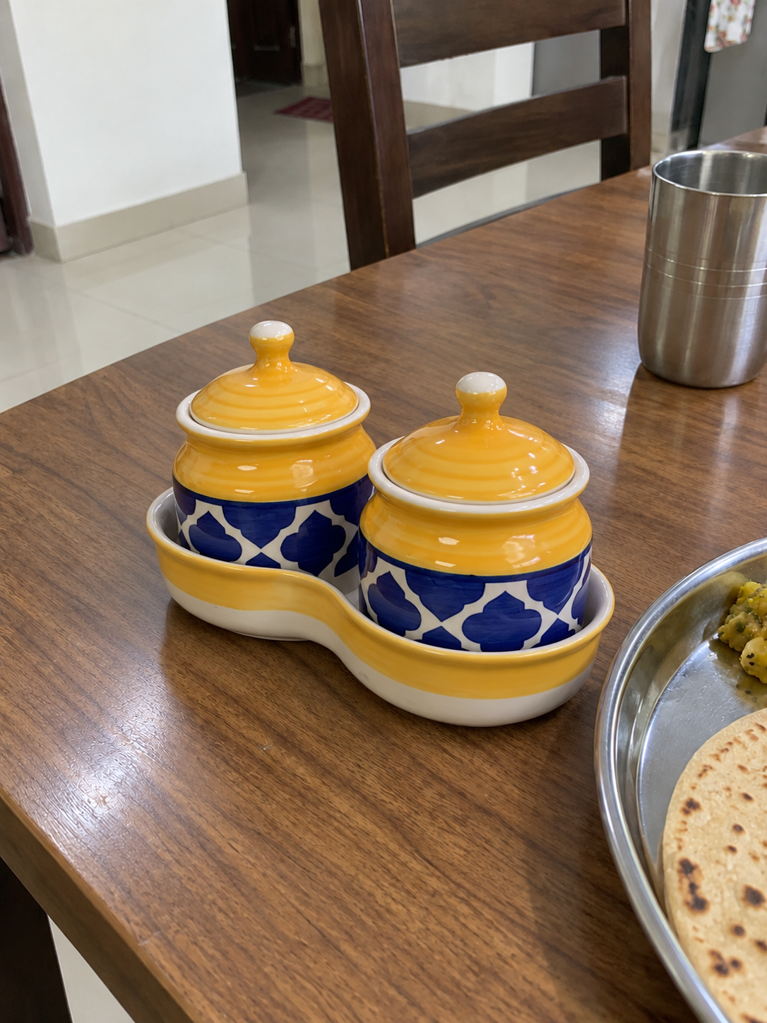 Yellow Geometric Ceramic Jar Set of 2 — side view on a dining table