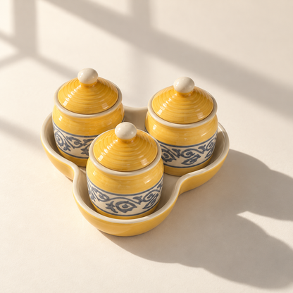 Yellow Floral Ceramic Jar Set of 3 with matching lids and tray on a plain ivory backdrop