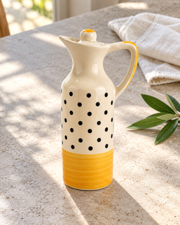 Mini Yellow Polka Dot Ceramic Oil Dispenser — sunlit table