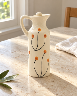 Mini Orange Floral Ceramic Oil Dispenser — sunlit table
