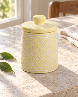 Soft Yellow Patterned Ceramic Storage Jar — sunlit table