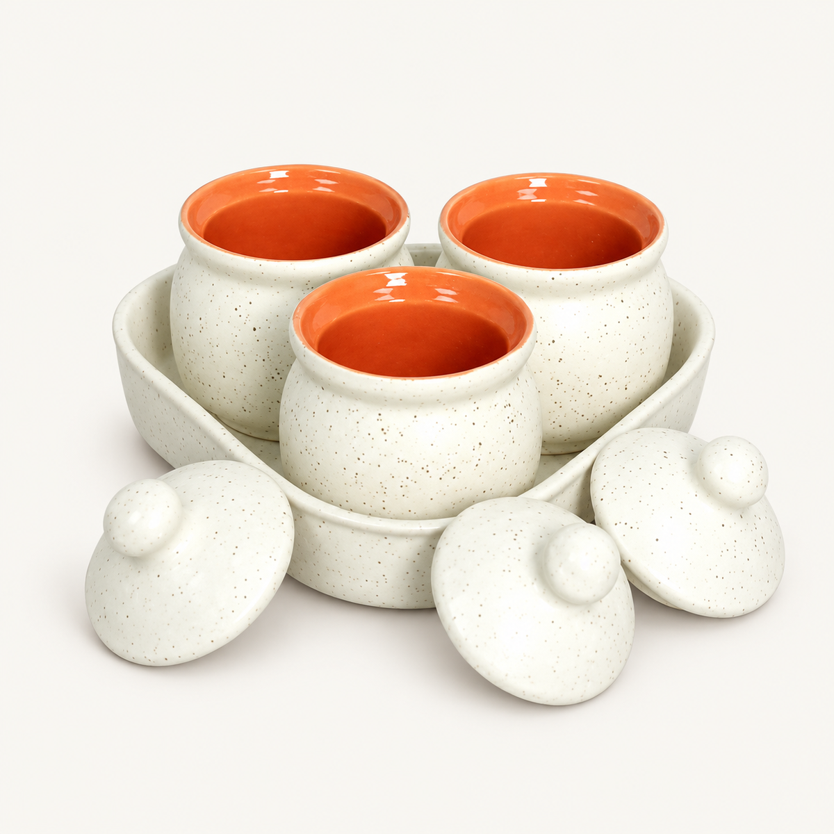 Speckled White Ceramic Jar Set of 3 — ivory ceramic pickle jar set lids off with orange glazed interiors